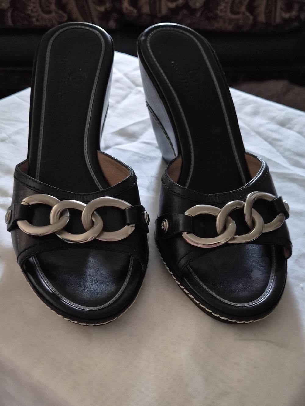 Black Cole Haan Slide Mules with Silver Chain Accent and  Heel